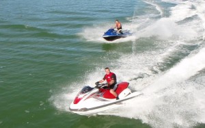 Tourists Jet Skiing in the Bay of Islands