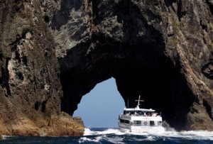 Fullers cruises at the famous Hole in the Rock, Bay of islands