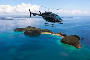 Salt Aie Helicopter flying above Roberton Island with aerial views of Twin Lagoons