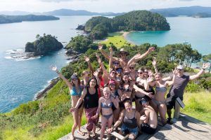 Tourists doing a Island stop on the Rock overnight Cruise