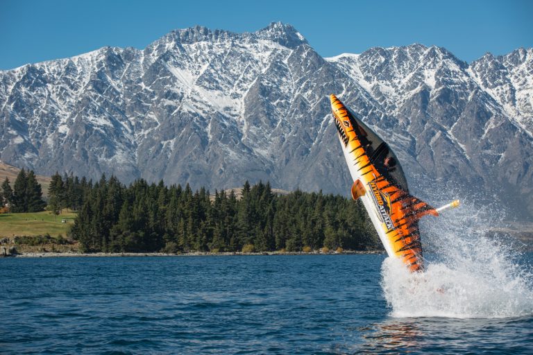 hydro-attack-queenstown-submersible-shark-ride-feature-1 | Must Do New Zealand Hydro Attack Queenstown semi-submersible shark on Lake Wakatipu jumping out of water
