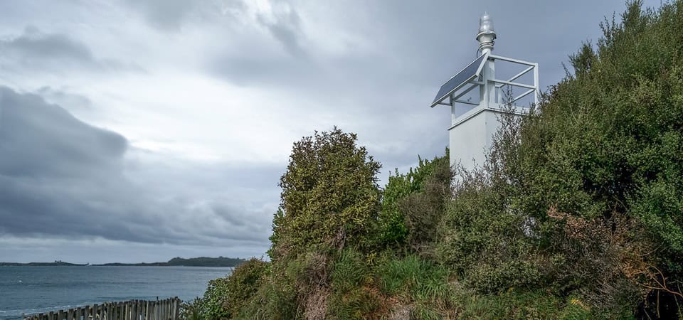 Ackers Point Lighthouse looking over the coastline on Stewart Island / Rakiura.